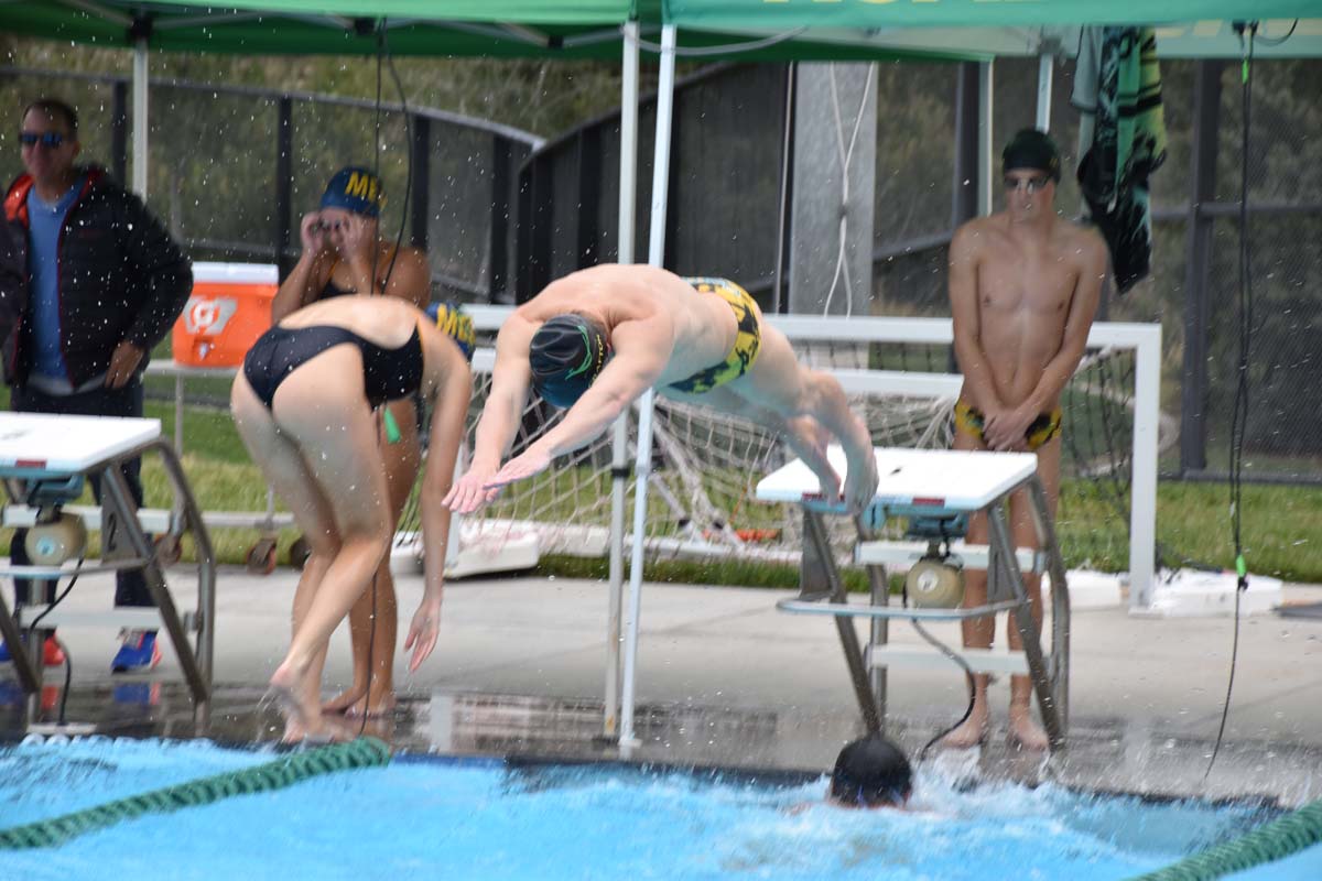 People enjoying the swim meet