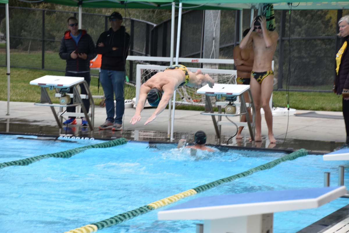 People enjoying the swim meet