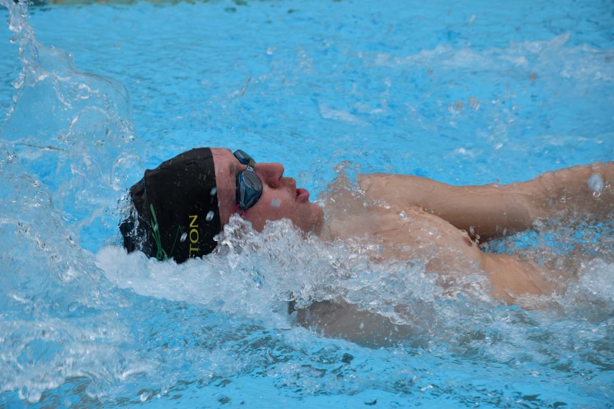 People enjoying the swim meet