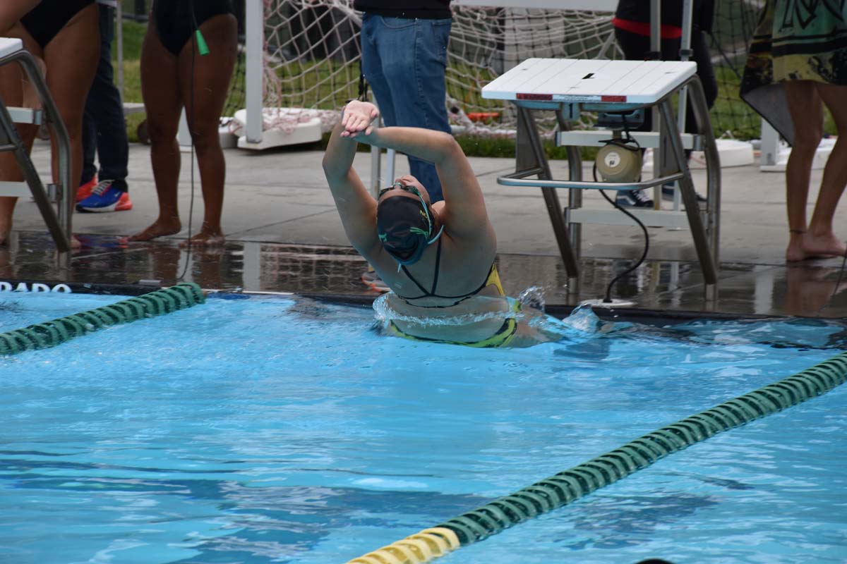 People enjoying the swim meet