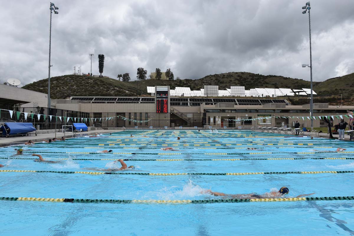 People enjoying the swim meet