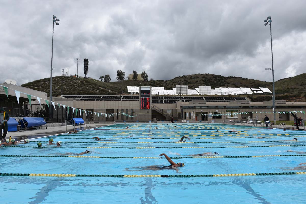 People enjoying the swim meet