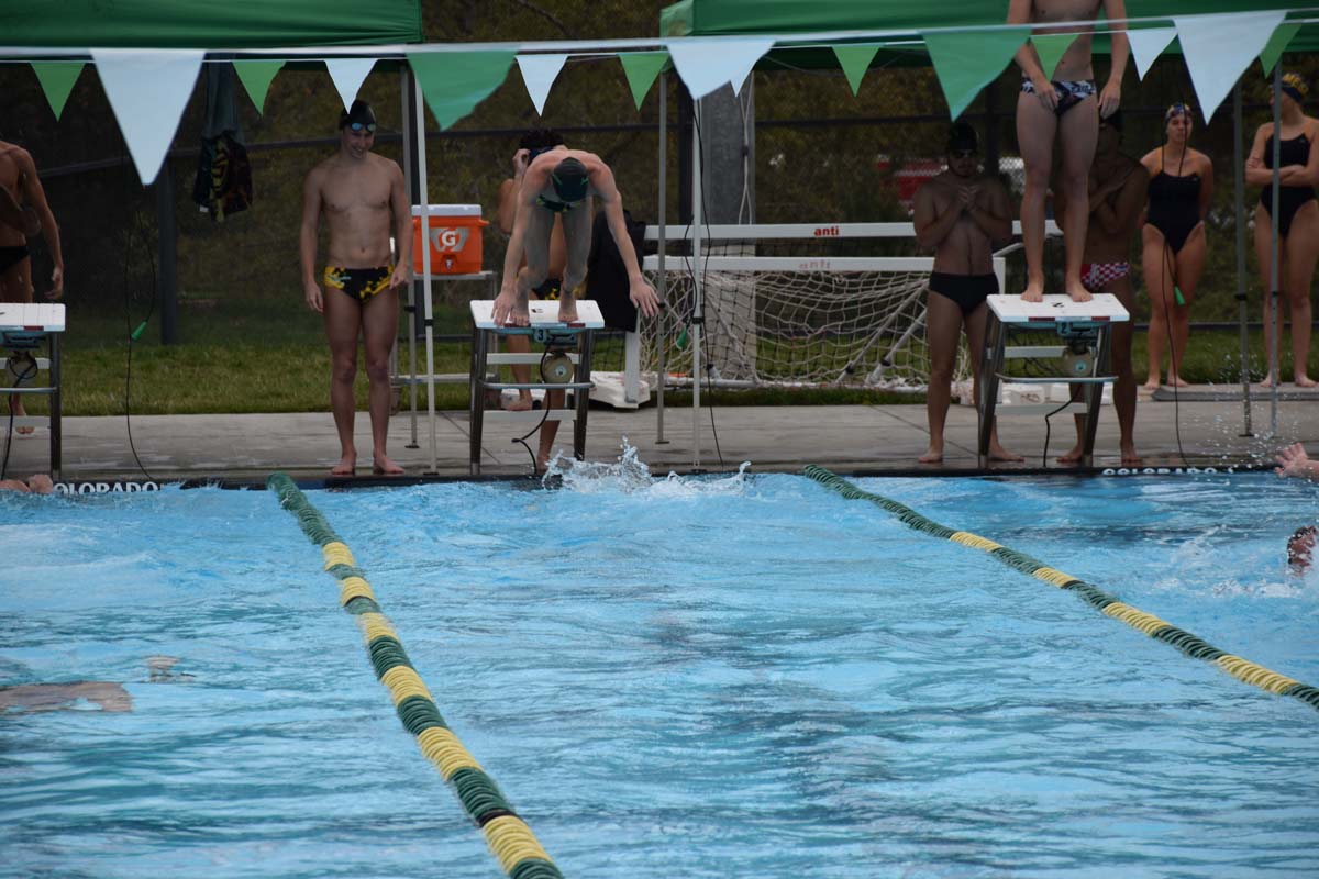 People enjoying the swim meet