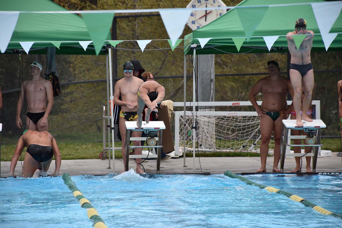 People enjoying the swim meet