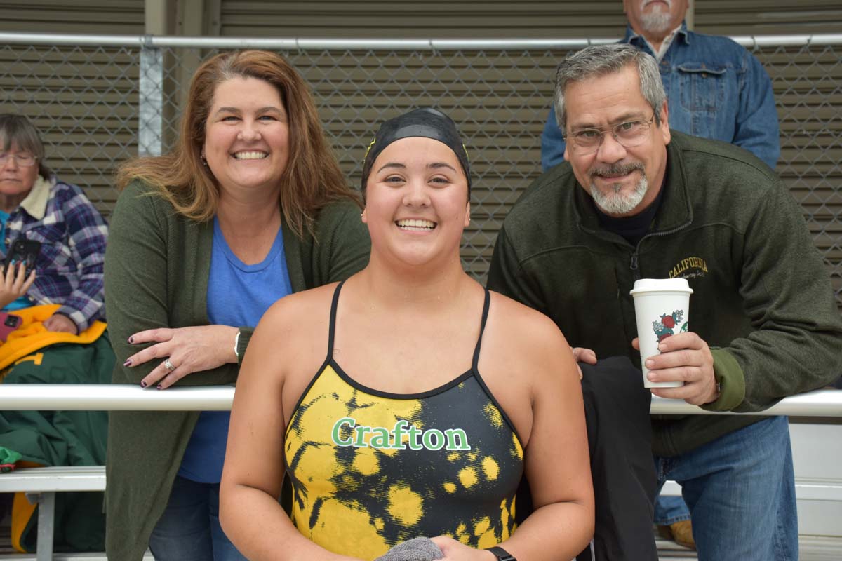 People enjoying the swim meet