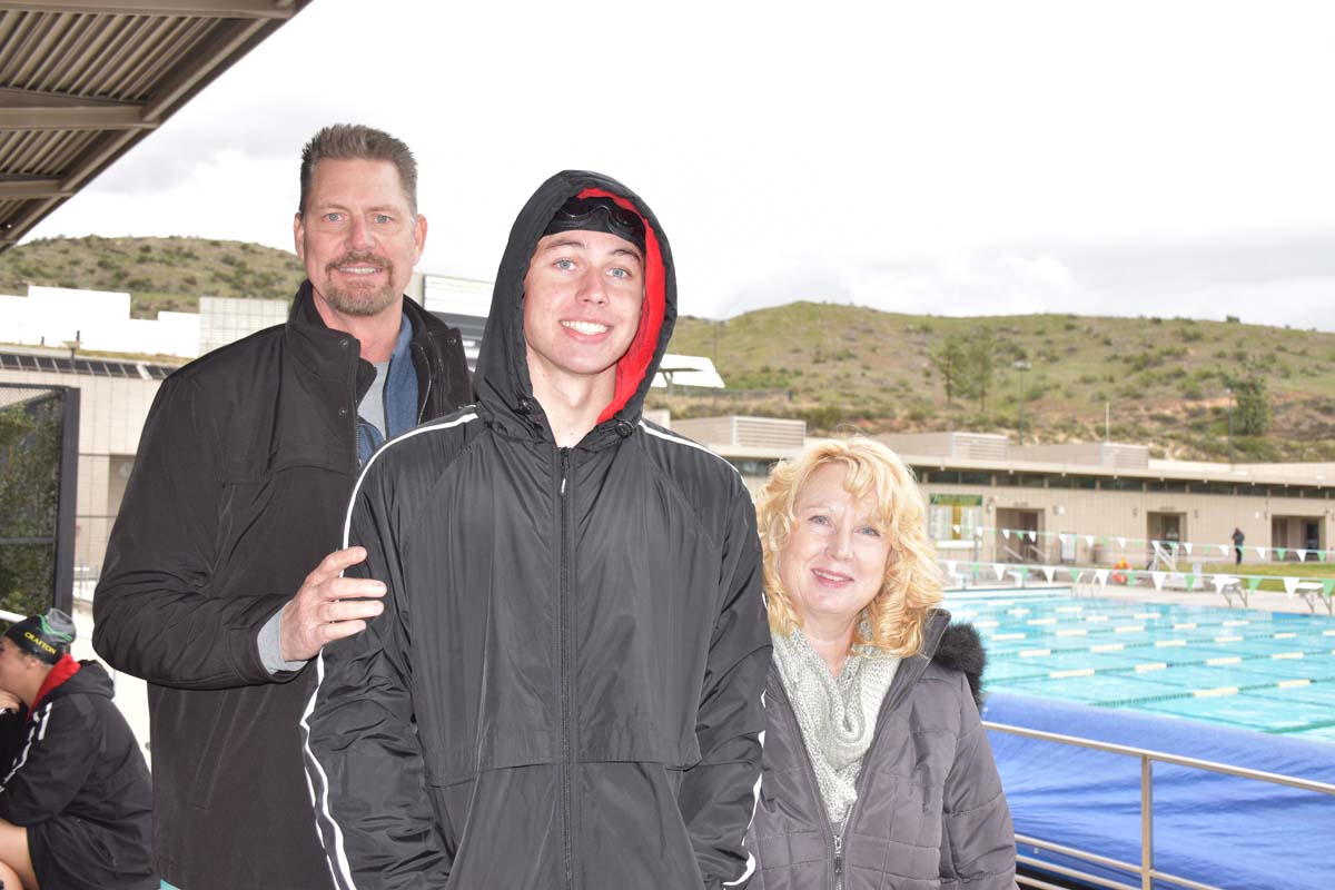 People enjoying the swim meet