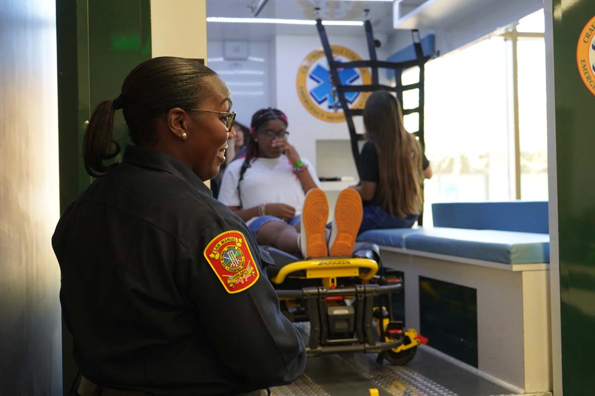 People enjoying Girl Scout event