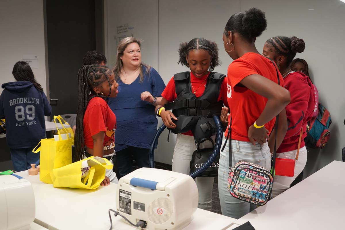 People enjoying Girl Scout event