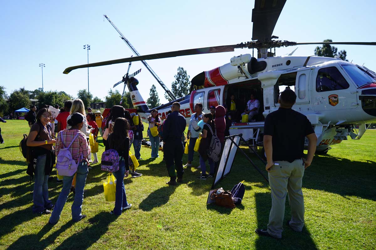 People enjoying Girl Scout event