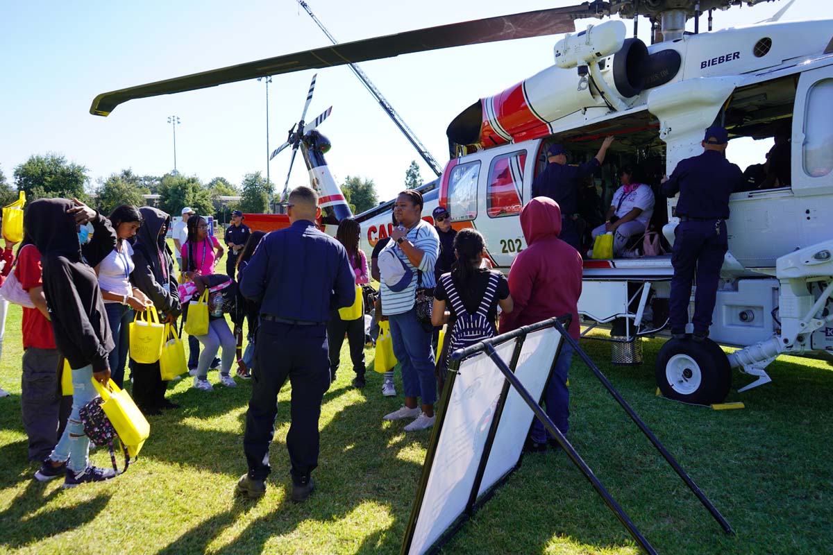 People enjoying Girl Scout event