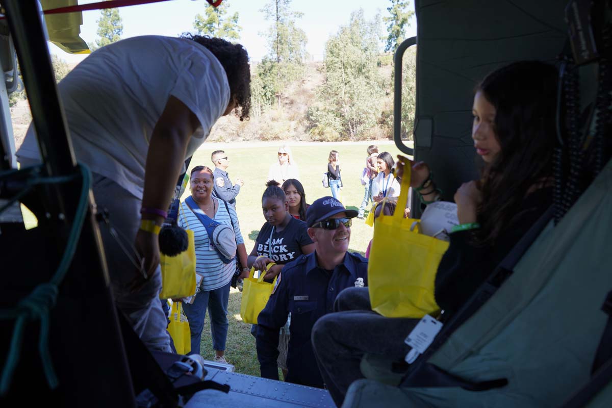 People enjoying Girl Scout event