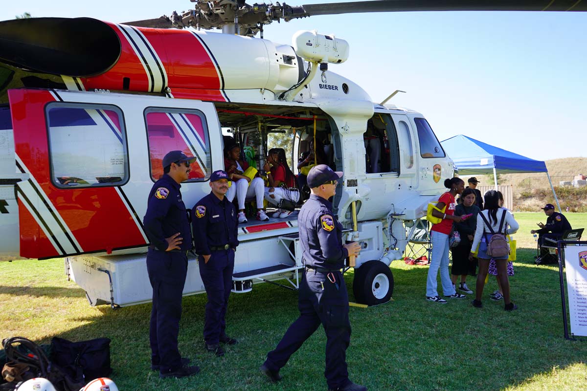 People enjoying Girl Scout event