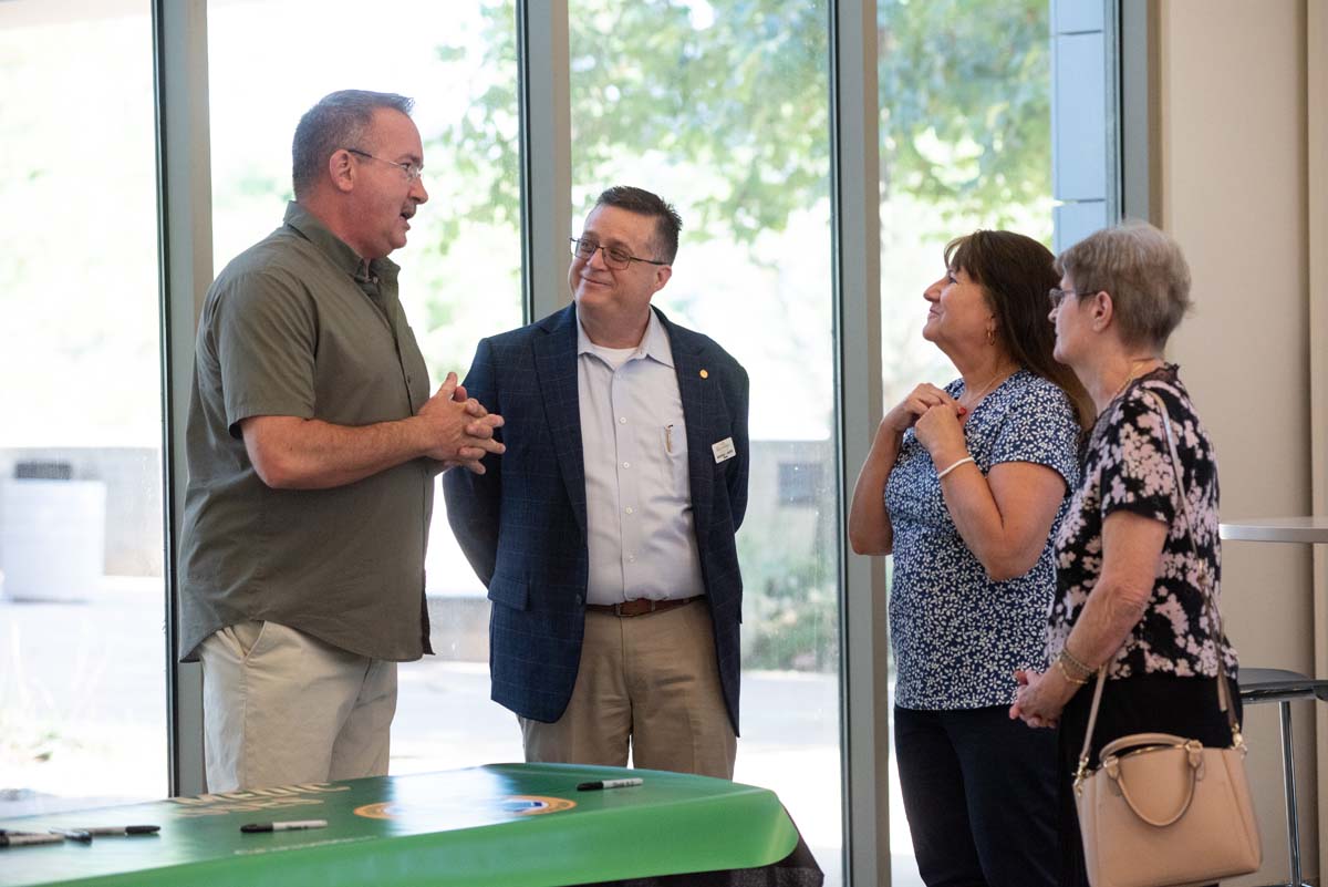 People enjoying the Paramedic Alumni Reception