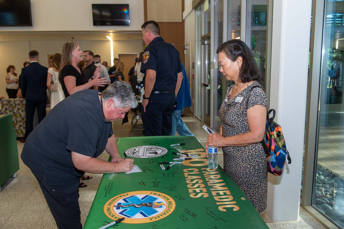 People enjoying the Paramedic Alumni Reception