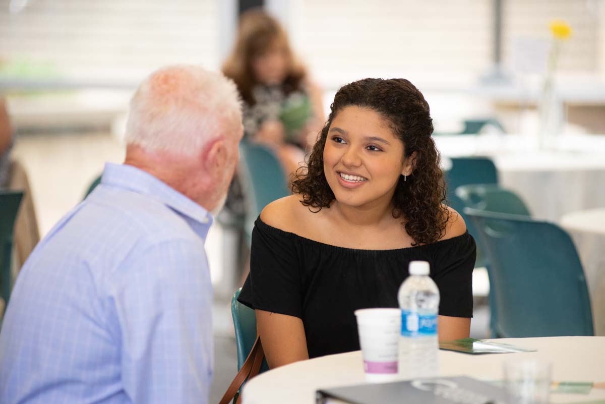 People enjoying the Scholarship Reception