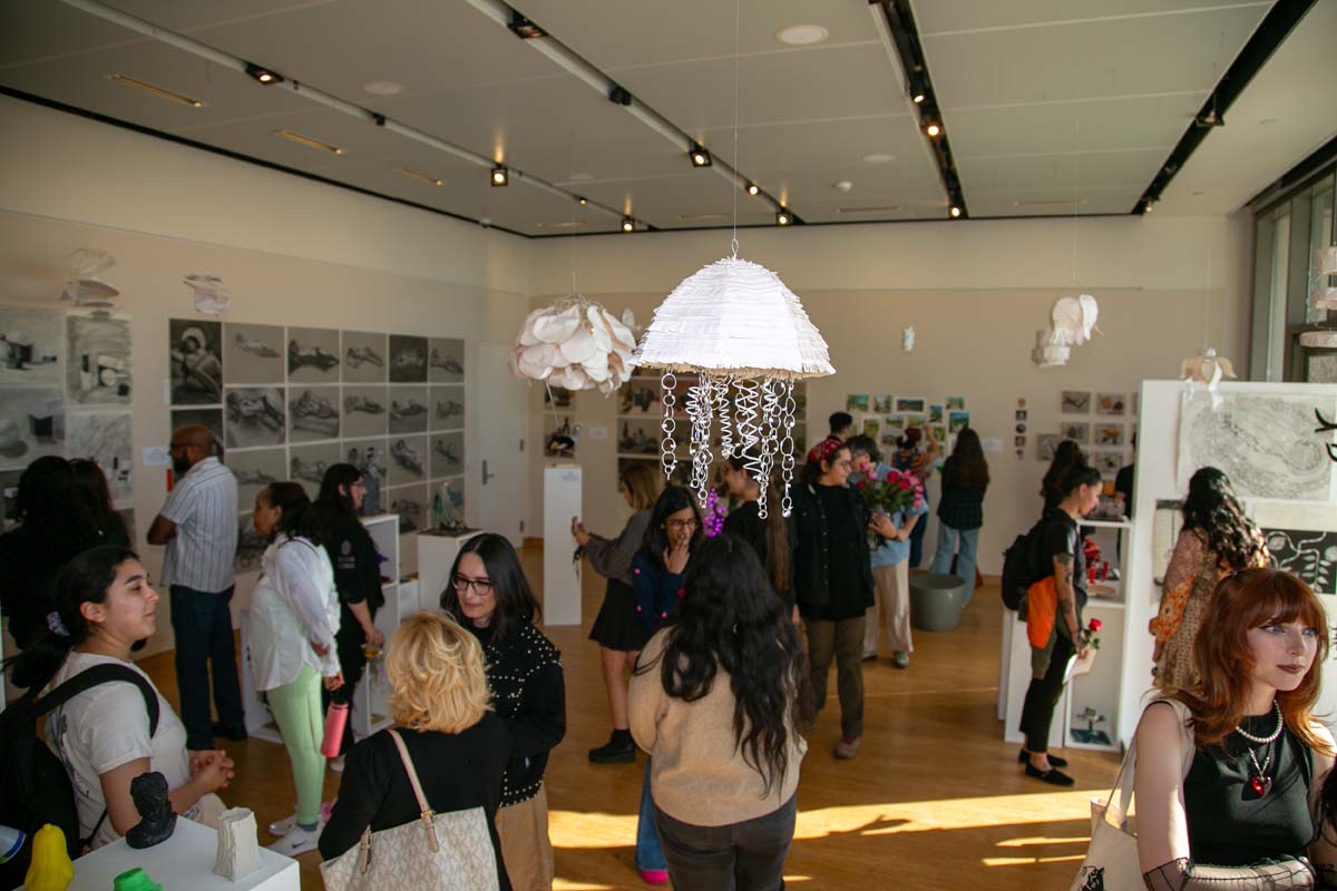 People enjoying the Student Art Show