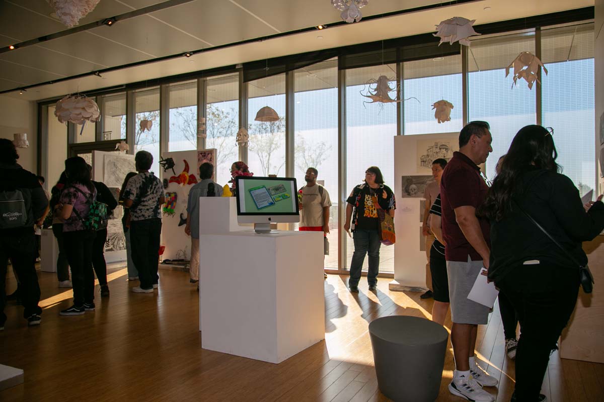 People enjoying the Student Art Show