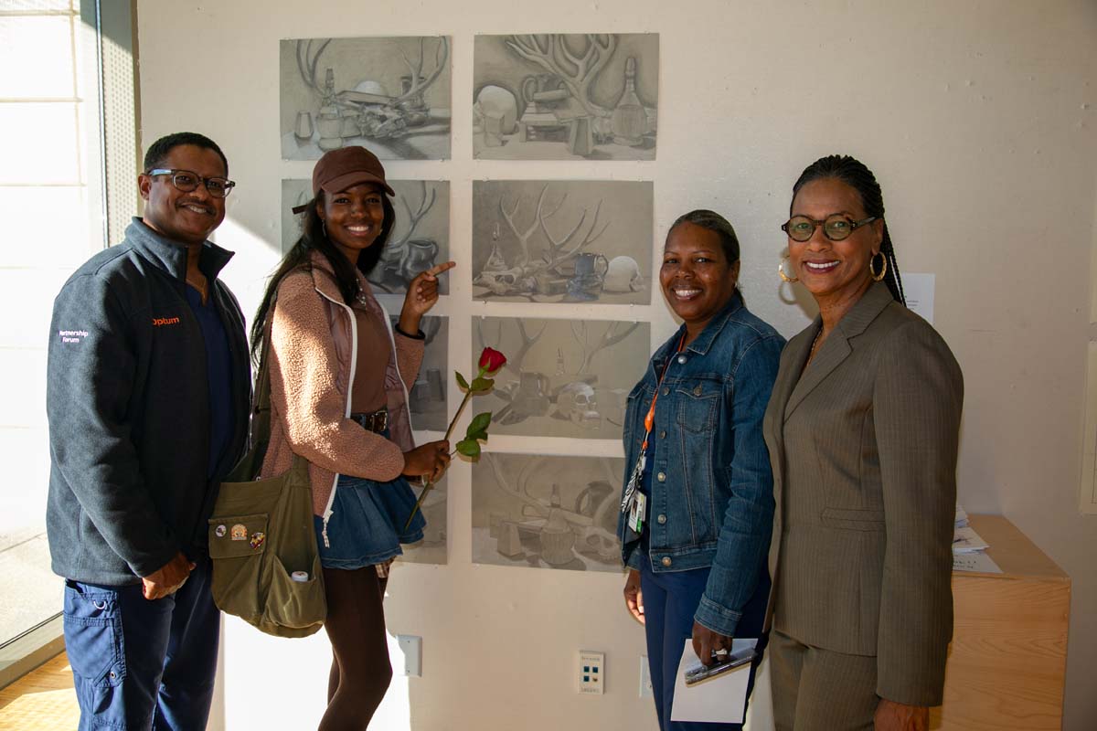 People enjoying the Student Art Show