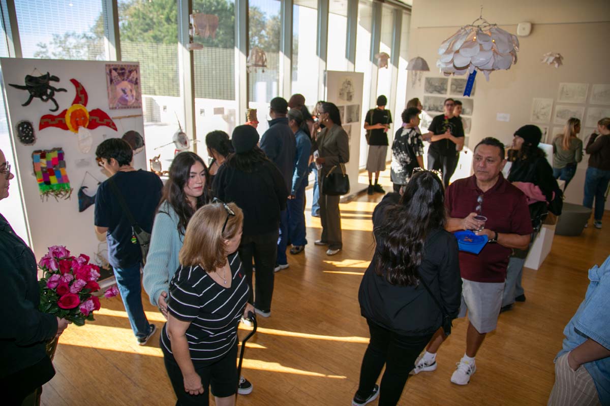 People enjoying the Student Art Show