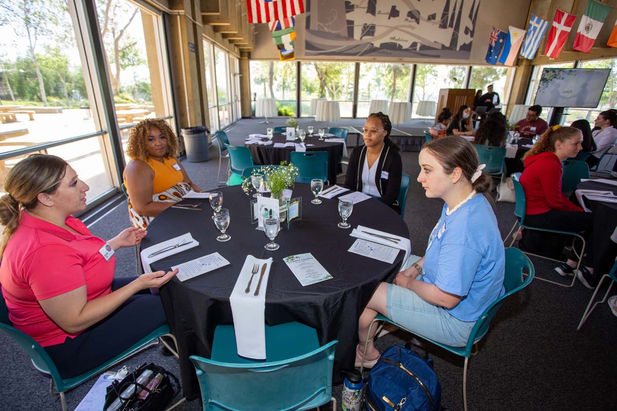 People enjoying the Etiquette Luncheon