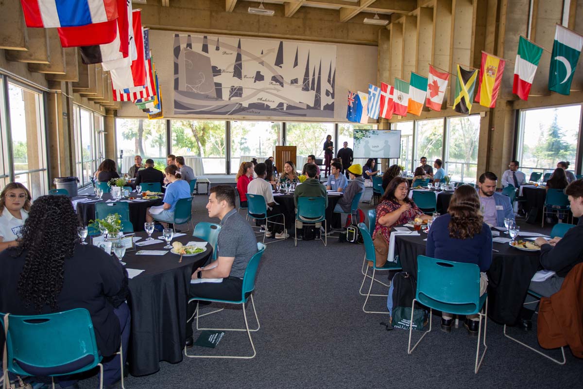 People enjoying the Etiquette Luncheon