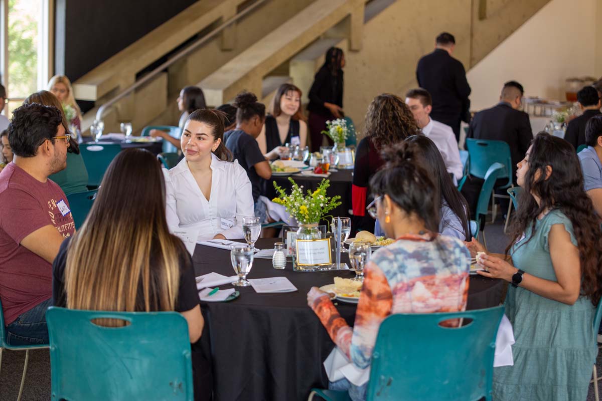 People enjoying the Etiquette Luncheon