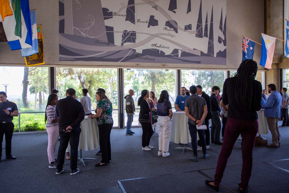 People enjoying the Etiquette Luncheon