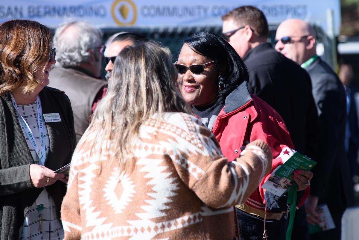 People enjoying the groundbreaking ceremony