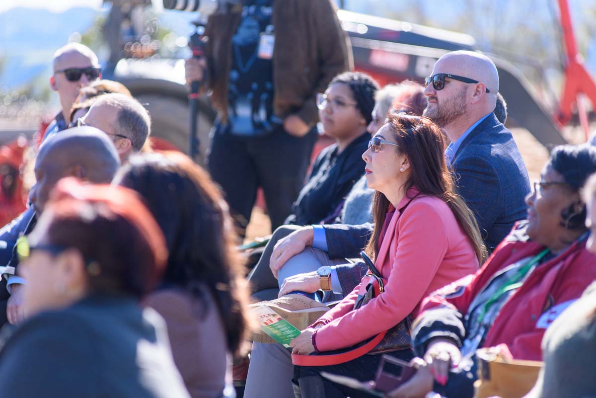 People enjoying the groundbreaking ceremony