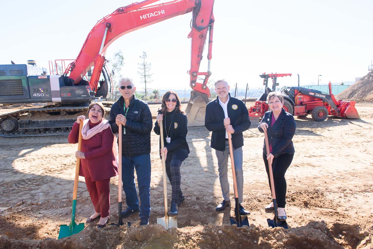 People enjoying the groundbreaking ceremony