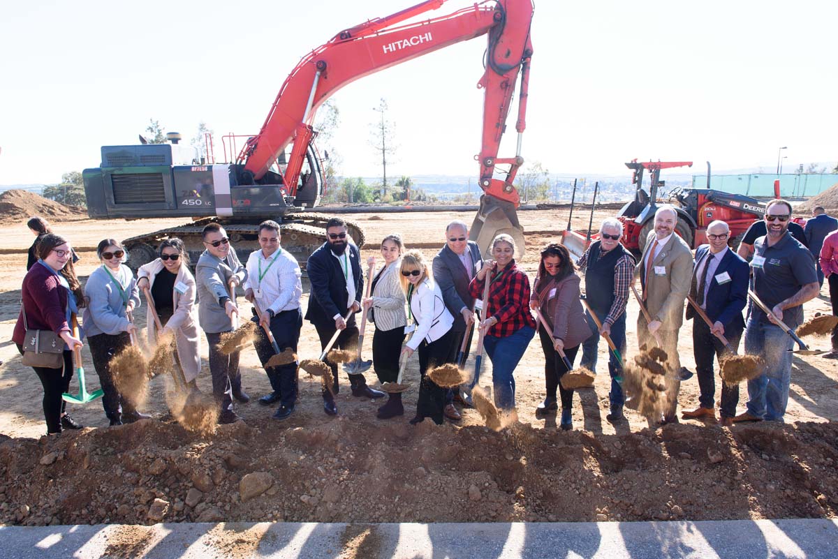 People enjoying the groundbreaking ceremony