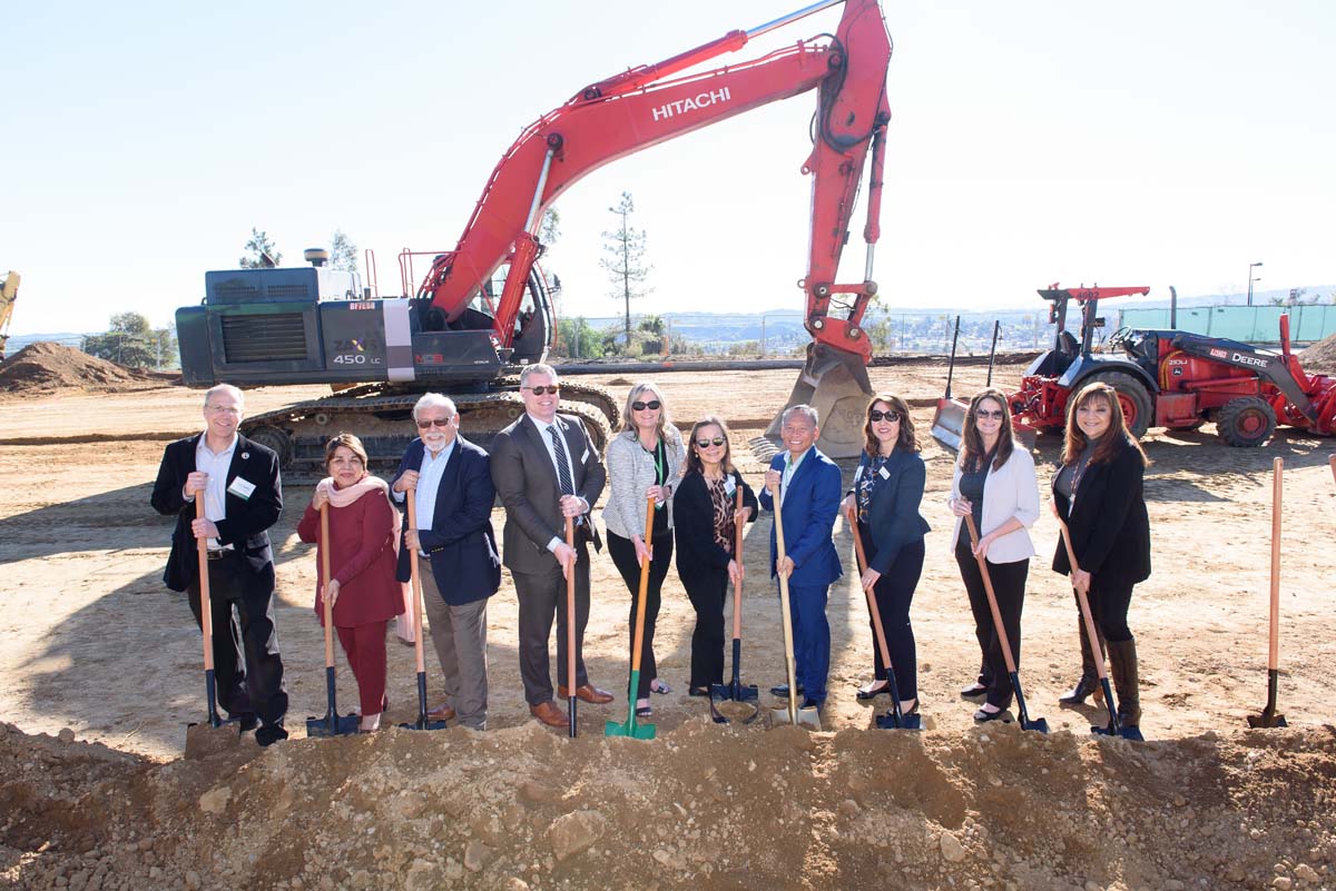 People enjoying the groundbreaking ceremony