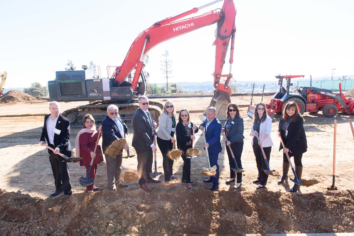 People enjoying the groundbreaking ceremony