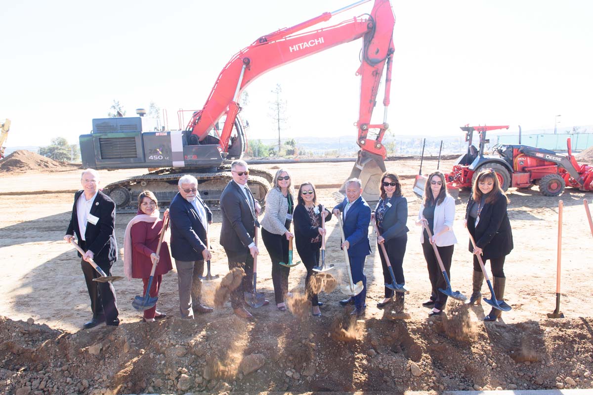 People enjoying the groundbreaking ceremony