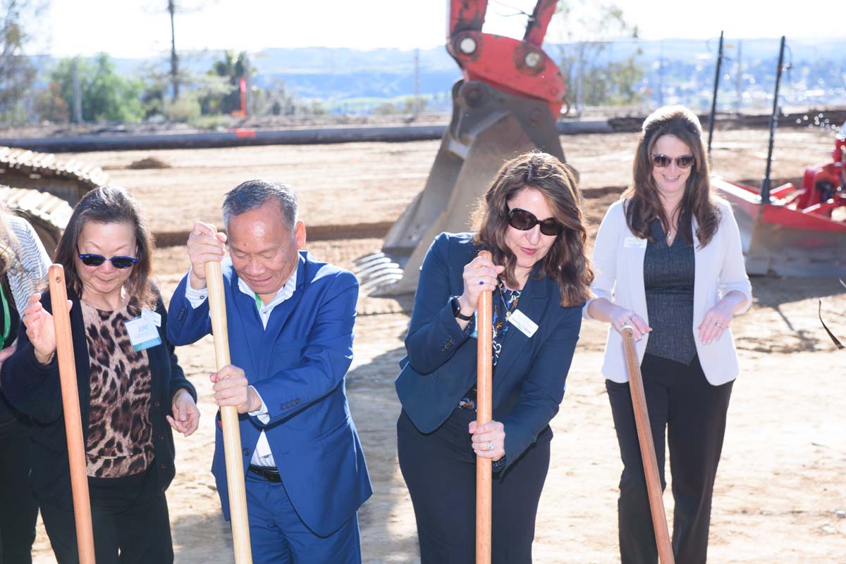 People enjoying the groundbreaking ceremony