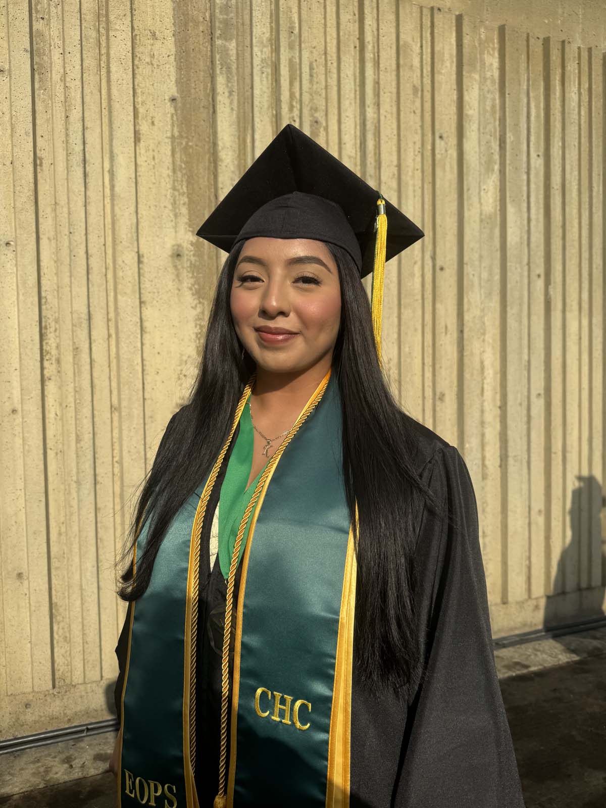 Graduates walk to stage at CHC's Commencement 2024.
