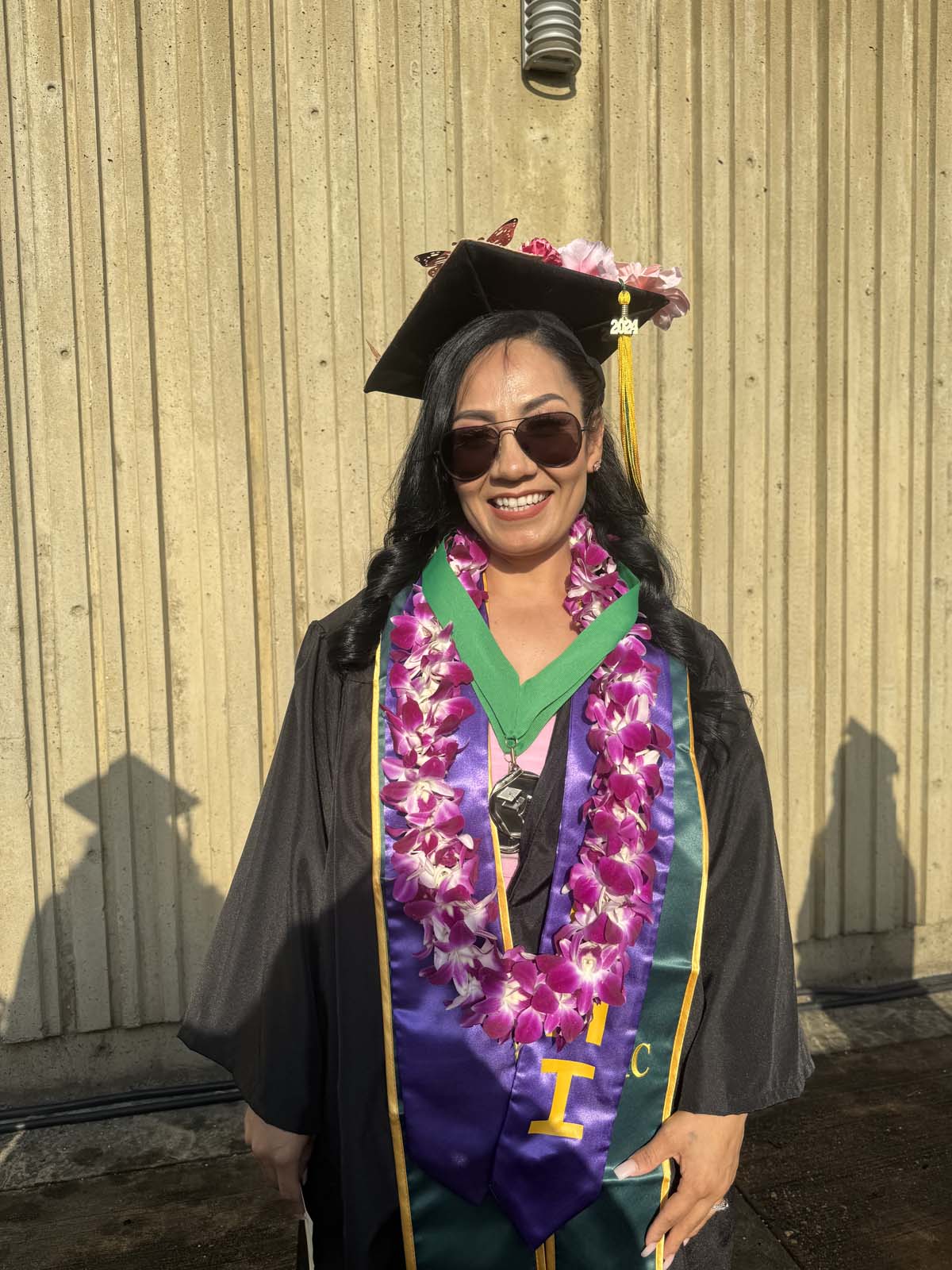 Graduates walk to stage at CHC's Commencement 2024.