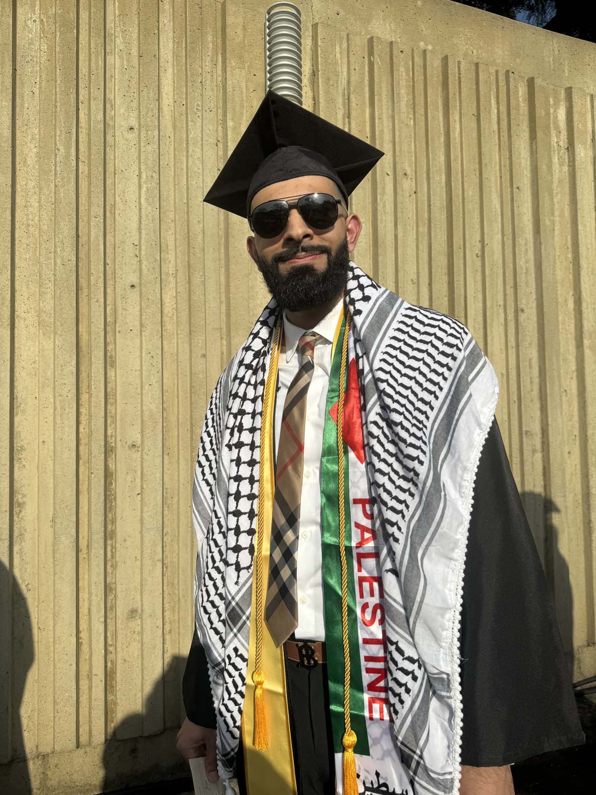 Graduates walk to stage at CHC's Commencement 2024.