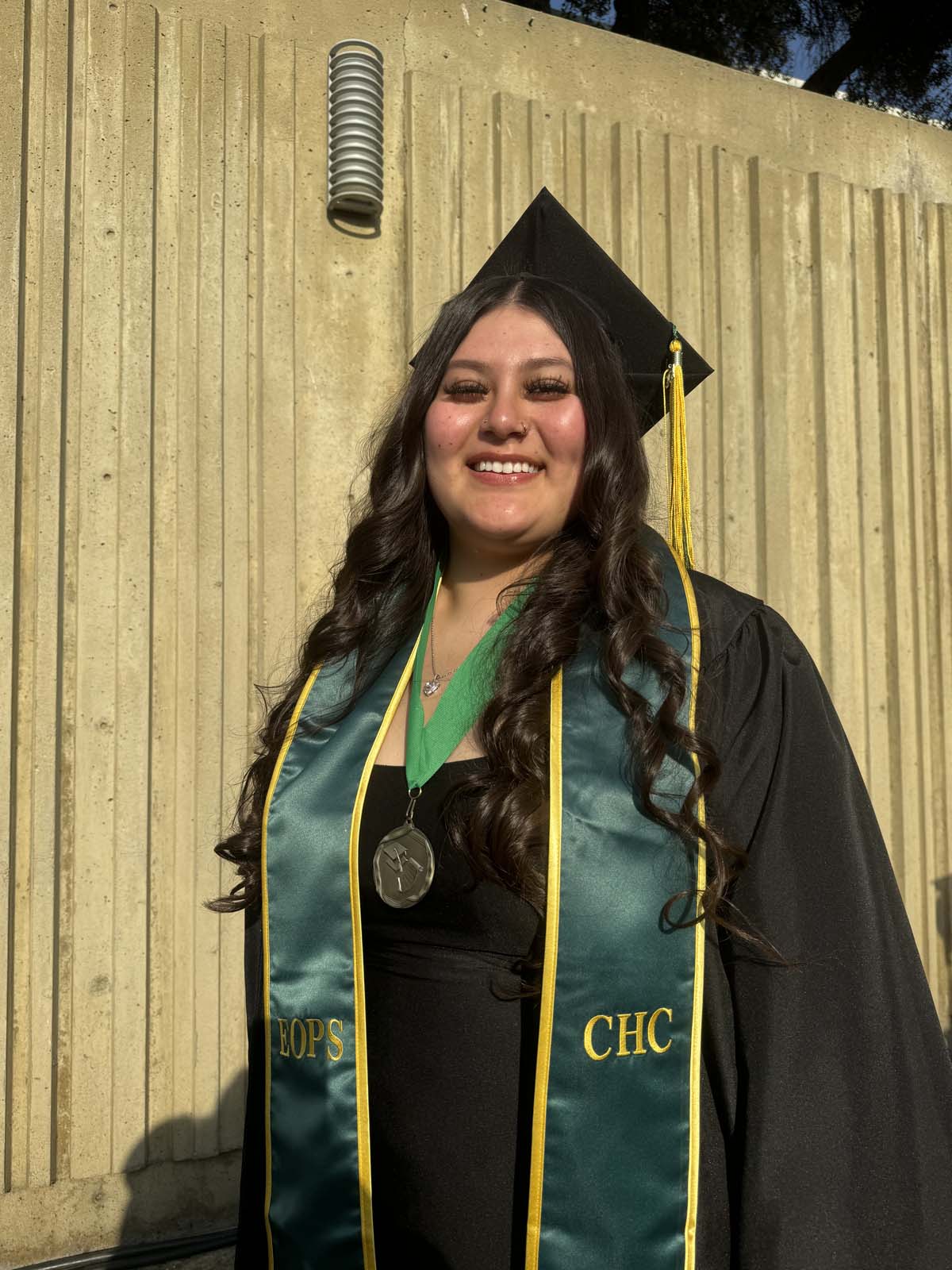 Graduates walk to stage at CHC's Commencement 2024.