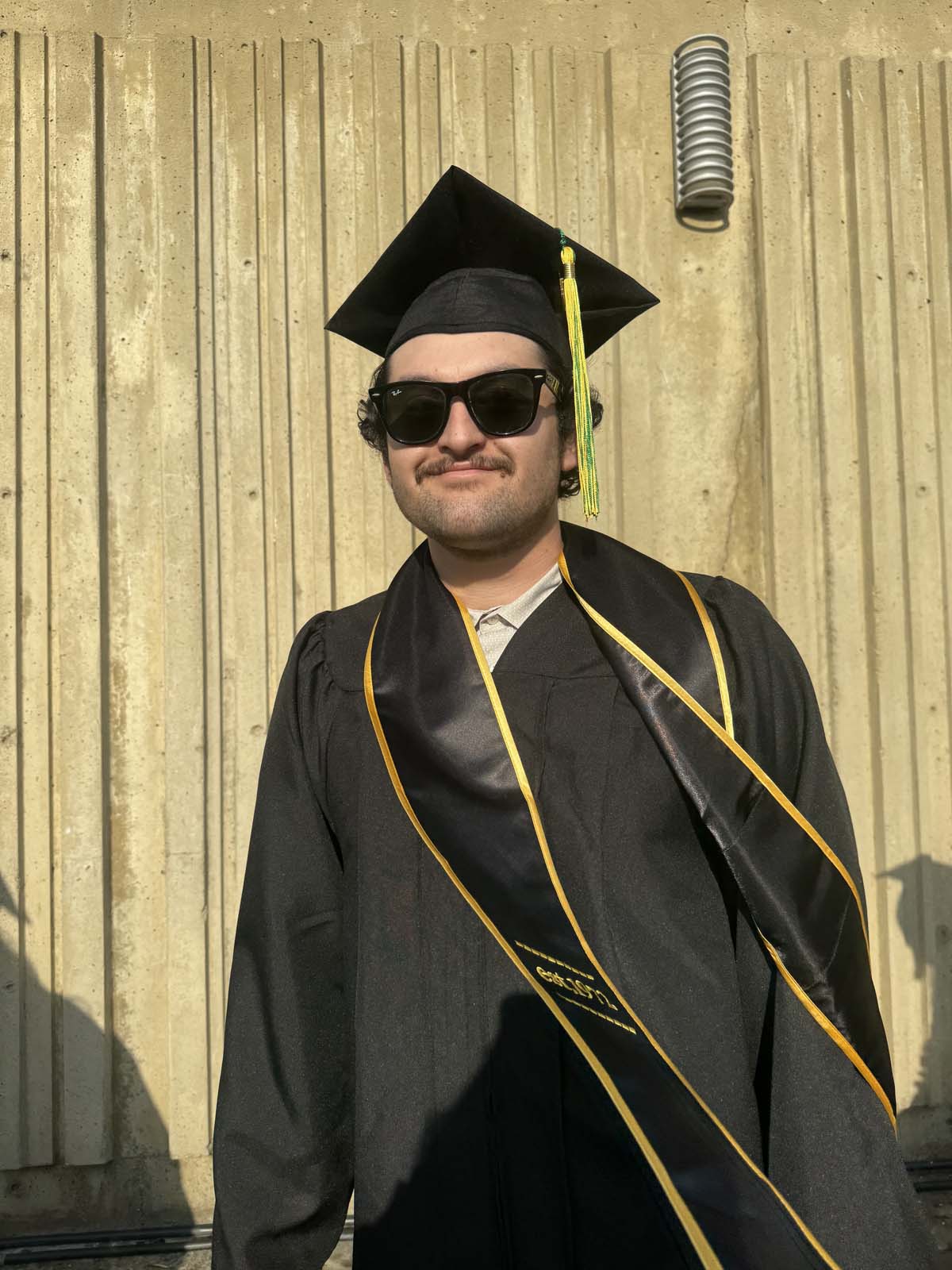 Graduates walk to stage at CHC's Commencement 2024.