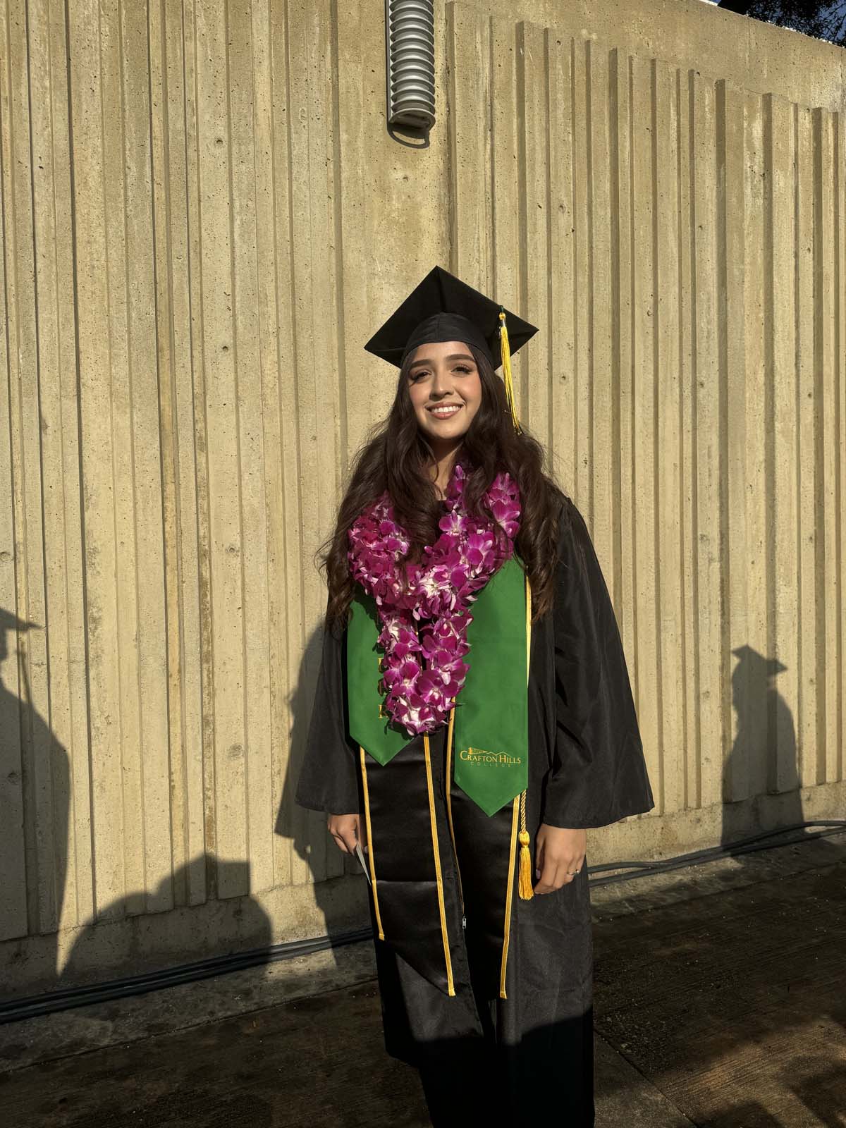 Graduates walk to stage at CHC's Commencement 2024.