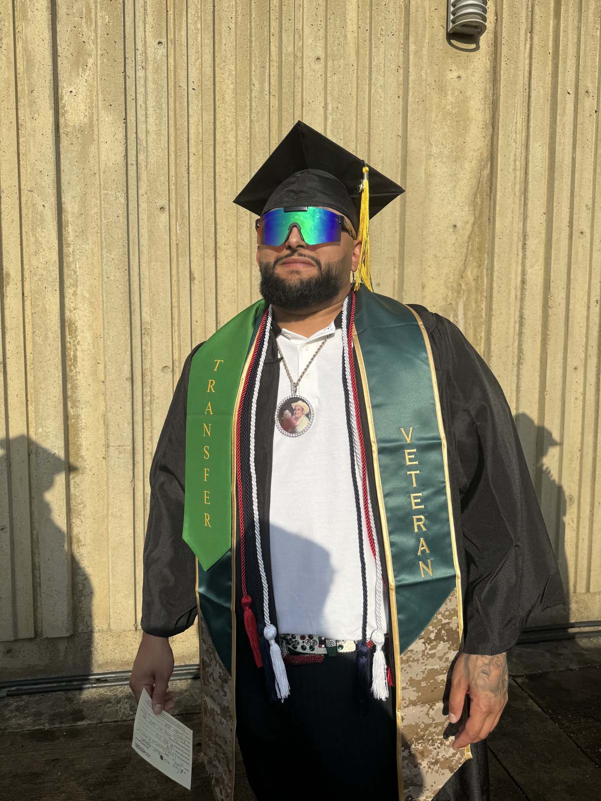 Graduates walk to stage at CHC's Commencement 2024.