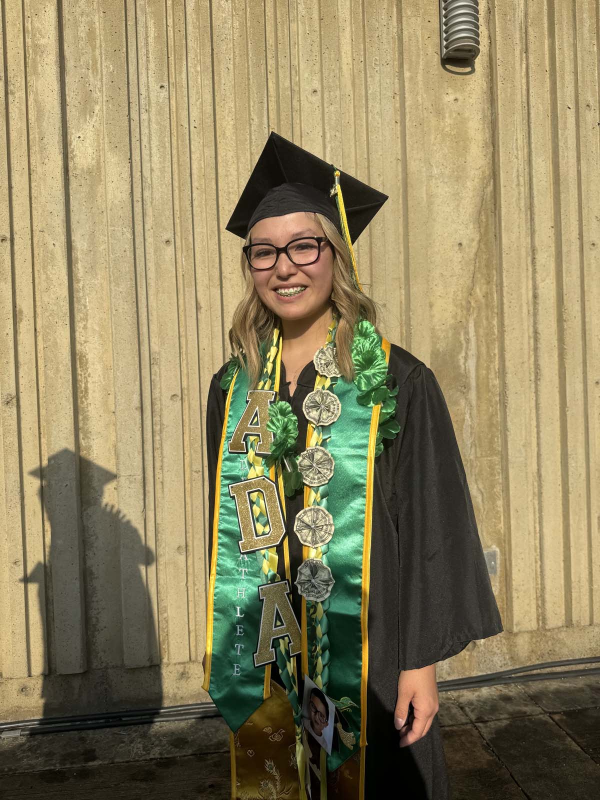 Graduates walk to stage at CHC's Commencement 2024.