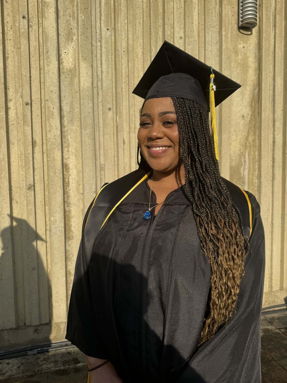 Graduates walk to stage at CHC's Commencement 2024.