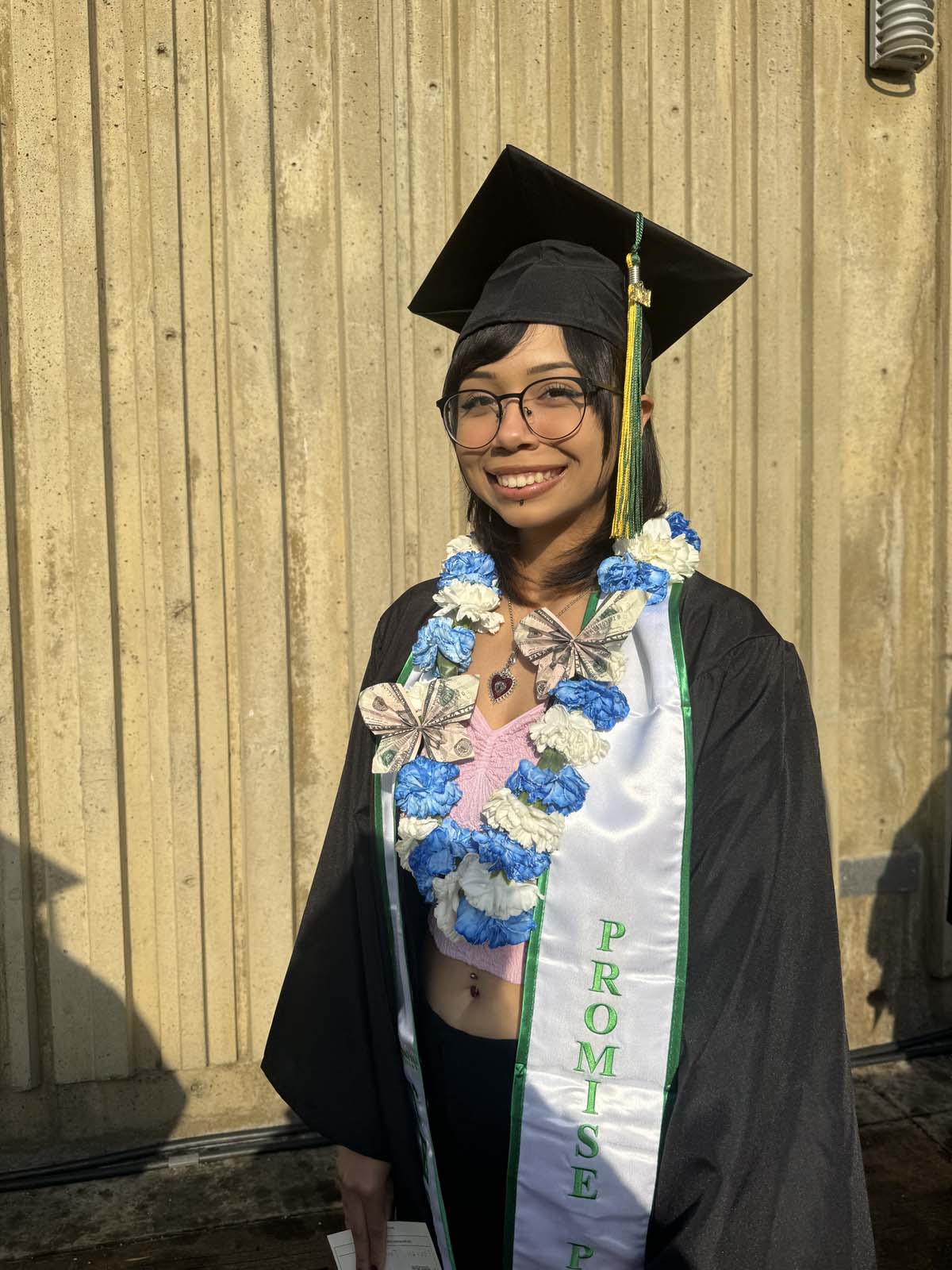 Graduates walk to stage at CHC's Commencement 2024.