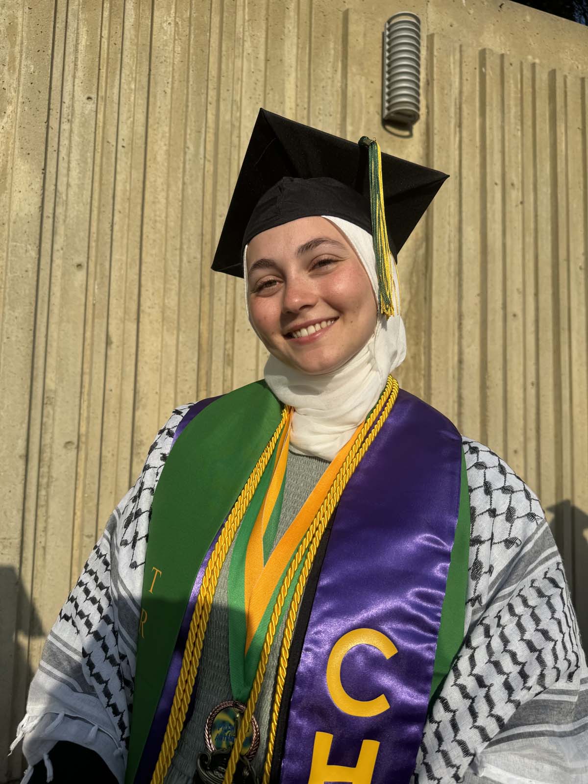 Graduates walk to stage at CHC's Commencement 2024.
