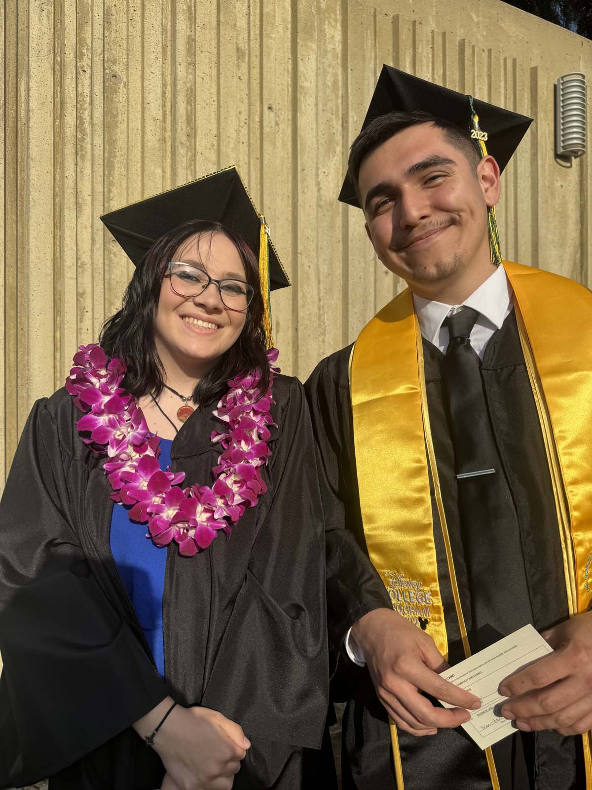 Graduates walk to stage at CHC's Commencement 2024.