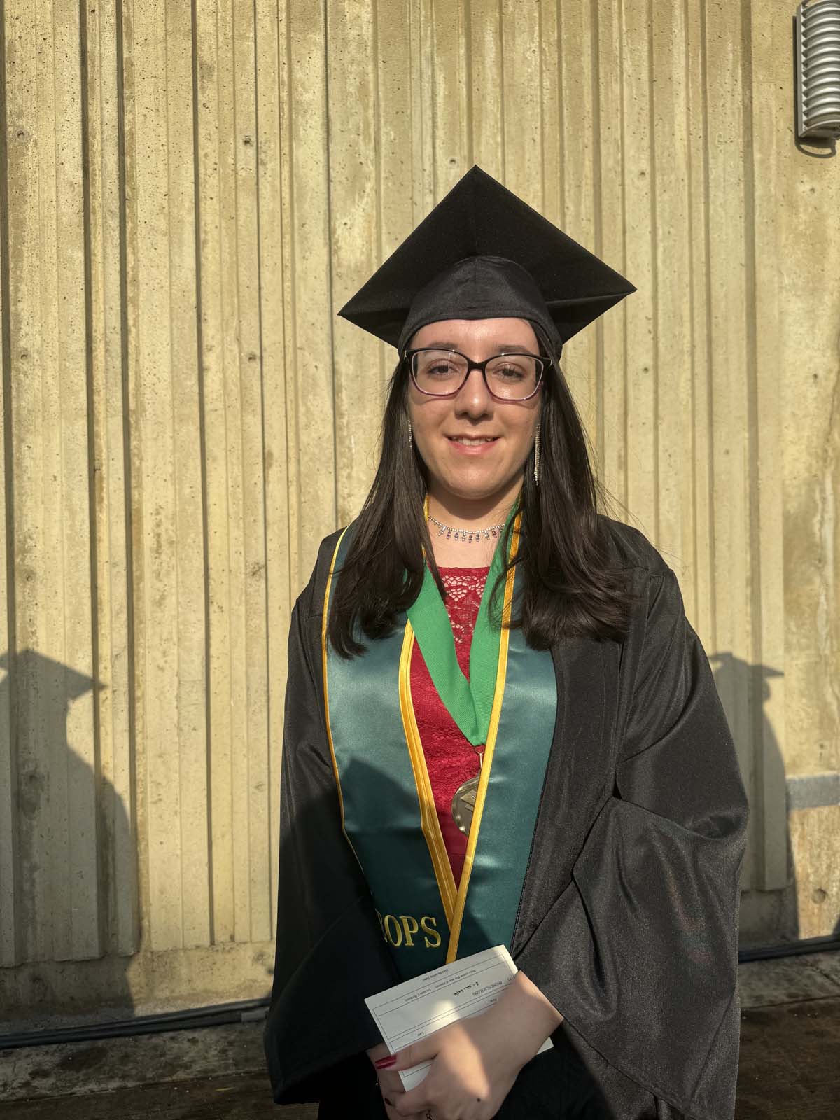 Graduates walk to stage at CHC's Commencement 2024.