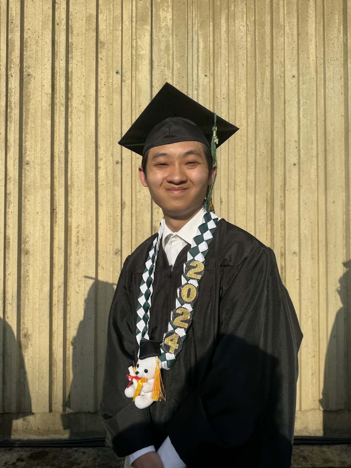 Graduates walk to stage at CHC's Commencement 2024.
