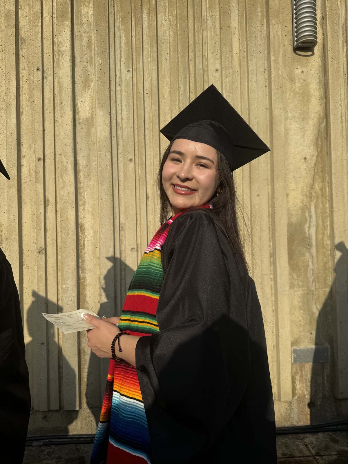 Graduates walk to stage at CHC's Commencement 2024.